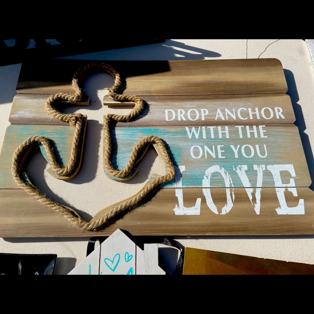 Drop anchor with love sign teal and white on brown